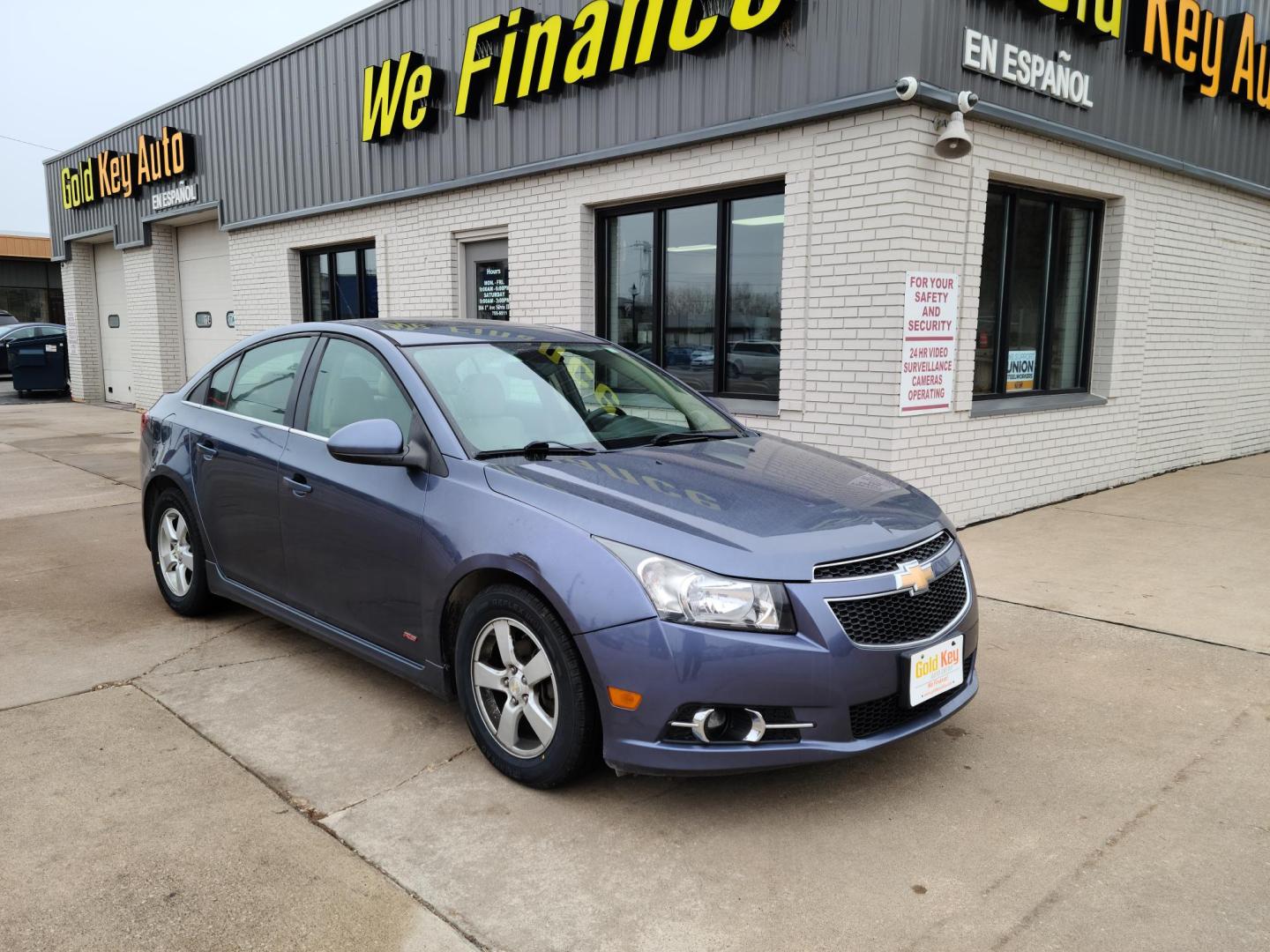 2013 Midnight Blue Metallic /Tan Chevrolet Cruze 2LT Auto (1G1PE5SB0D7) with an 1.4L L4 DOHC 16V TURBO engine, 6-Speed Automatic transmission, located at 104 1st Avenue, Silvis, IL, 61282, (309) 755-9511, 41.515156, -90.425377 - Photo#0
